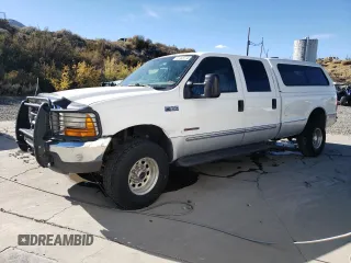 2000 Ford F-350 XL with VIN 1FTSW31F5YEA50810, listed as a Copart auction lot 83274144 with 147,370 mi miles and Salvage Title. Bid and sale history available at DreamBid. Image 1.