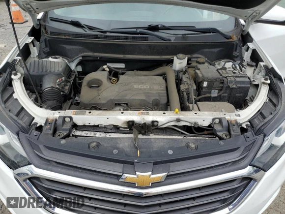 2018 Chevrolet Equinox LT z VIN 3GNAXSEV7JS593275, wystawiony jako Copart lot #57420565 z przebiegiem 83 977 mil mil oraz Szkoda całkowita • Salvage title. Historia ofert i sprzedaży dostępna na DreamBid. Obrazek 12.
