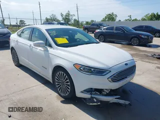 2018 Ford Fusion Titanium with VIN 3FA6P0RU3JR124007, listed as a IAAI auction lot 42207863 with 179,708 mi miles and . Bid and sale history available at DreamBid. Image 1.