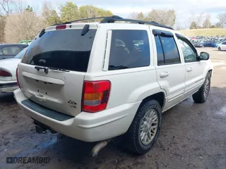 2003 Jeep Grand Cherokee Limited with VIN 1J4GW58N63C505919, listed as a IAAI auction lot 41566997 with 233,827 mi miles. Bid and sale history available at carsss.com. Image 4.