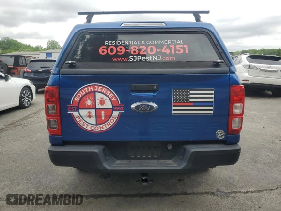 2020 Ford Ranger XL with VIN 1FTER4FHXLLA86940, listed as a Copart auction lot 58614045 with 77,249 mi miles and Salvage title. Bid and sale history available at DreamBid. Image 6.
