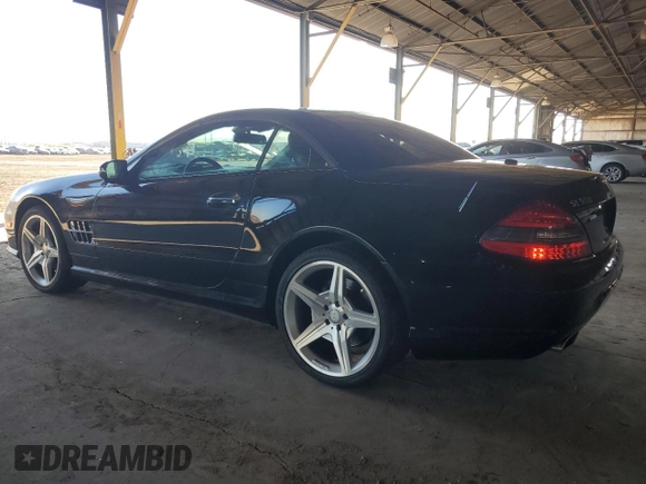 2011 Mercedes-Benz SL 550 z VIN WDBSK7BAXBF165859, wystawiony jako Copart lot #80166084 z przebiegiem 33 119 mil mil oraz Czysty tytuł • Clean title. Historia ofert i sprzedaży dostępna na DreamBid. Obrazek 2.