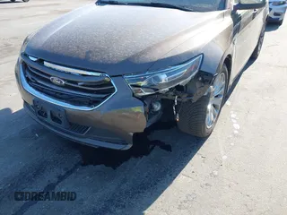 2016 Ford Taurus Limited z VIN 1FAHP2F81GG109548, wystawiony jako IAAI lot #42177871 z przebiegiem 168 611 mil mil oraz . Historia ofert i sprzedaży dostępna na DreamBid. Obrazek 6.