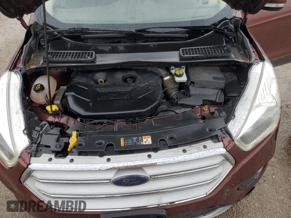 2018 Ford Escape Titanium z VIN 1FMCU0J93JUA70449, wystawiony jako Copart lot #59303245 z przebiegiem 165 907 mil mil oraz Szkoda całkowita • Salvage title. Historia ofert i sprzedaży dostępna na DreamBid. Obrazek 11.