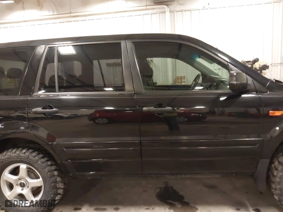 2007 Honda Pilot LX with VIN 5FNYF18117B009290, listed as a IAAI auction lot 41205310 with 150,081 mi miles. Bid and sale history available at carsss.com. Image 14.