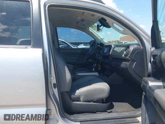 2018 Toyota Tacoma SR with VIN 3TMCZ5AN2JM172829, listed as a IAAI auction lot 42073847 with 136,671 mi miles and . Bid and sale history available at carsss.com. Image 5.