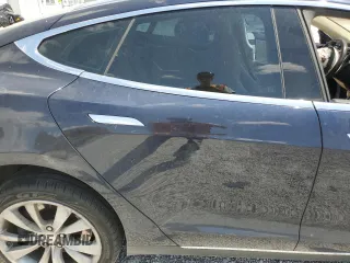 2014 Tesla Model S 60 with VIN 5YJSA1S12EFP29885, listed as a Copart auction lot 59769215 with Not provided miles and Salvage title. Bid and sale history available at DreamBid. Image 10.
