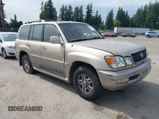 2001 Lexus LX 470 z VIN JTJHT00W413507883, wystawiony jako IAAI lot #42462661 z przebiegiem 235 943 mil mil oraz . Historia ofert i sprzedaży dostępna na DreamBid. Obrazek 1.