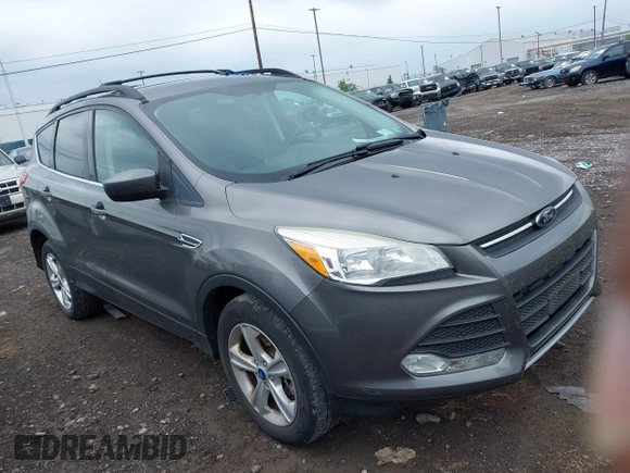 2013 Ford Escape SE with VIN 1FMCU9GX4DUB35629, listed as a IAAI auction lot 42446685 with 103,420 mi miles and . Bid and sale history available at DreamBid. Image 1.