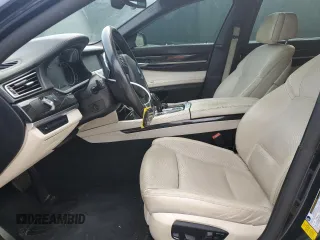 2015 BMW 7 Series 750i z VIN WBAYA8C51FG197764, wystawiony jako Copart lot #67095554 z przebiegiem 167 458 mil mil oraz Szkoda całkowita • Salvage title. Historia ofert i sprzedaży dostępna na DreamBid. Obrazek 7.