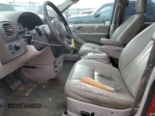 2005 Dodge Caravan SXT with VIN 2D4GP44L25R456250, listed as a Copart auction lot 83081644 with 277,196 mi miles and Salvage Title. Bid and sale history available at DreamBid. Image 7.
