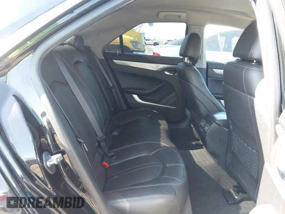 2013 Cadillac CTS Luxury with VIN 1G6DE5E51D0165634, listed as a IAAI auction lot 42208023 with 92,827 mi miles and . Bid and sale history available at DreamBid. Image 8.