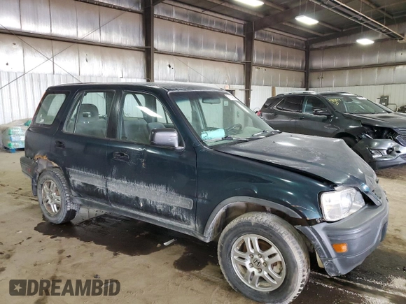 1997 Honda CR-V with VIN JHLRD184XVC032018, listed as a Copart auction lot 71179594 with 135,000 mi miles and Salvage Title. Bid and sale history available at carsss.com. Image 4.