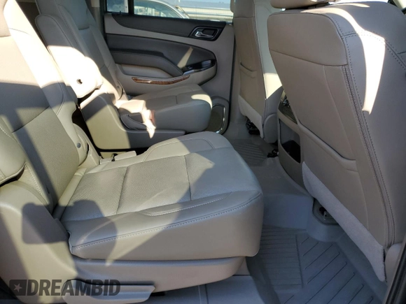 2019 Chevrolet Suburban Premier with VIN 1GNSKJKC6KR293389, listed as a Copart auction lot 77700264 with 49,057 mi miles and Salvage Title. Bid and sale history available at DreamBid. Image 11.