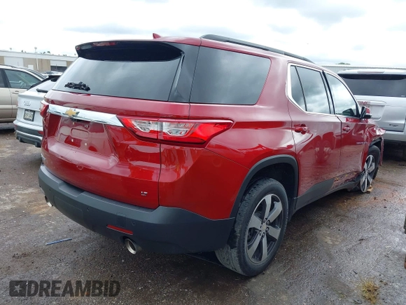 2020 Chevrolet Traverse LT with VIN 1GNERHKW7LJ273289, listed as a IAAI auction lot 42356645 with 66,156 mi miles and . Bid and sale history available at DreamBid. Image 4.