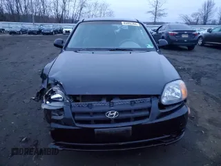 2004 Hyundai Accent GL with VIN KMHCG35CX4U312284, listed as a Copart auction lot 83992384 with 88,786 mi miles and Salvage Title. Bid and sale history available at carsss.com. Image 5.