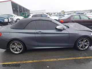 2015 BMW 2 Series M235i with VIN WBA1M1C50FV393092, listed as a IAAI auction lot 41507537 with 79,321 mi miles. Bid and sale history available at carsss.com. Image 13.