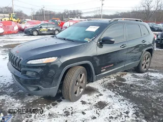 2016 Jeep Cherokee Latitude with VIN 1C4PJMCS1GW326557, listed as a IAAI auction lot 41474801 with 207,805 mi miles. Bid and sale history available at carsss.com. Image 2.