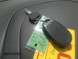 2001 Nissan Sentra GXE z VIN 3N1CB51D61L500385, wystawiony jako IAAI lot #28091277 z przebiegiem 172 807 mil mil oraz . Historia ofert i sprzedaży dostępna na DreamBid. Obrazek 11.