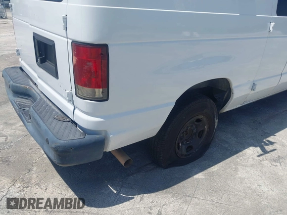 2010 Ford Econoline Cargo Commercial with VIN 1FTNE2EL1ADA10665, listed as a IAAI auction lot 41861433 with 183,657 mi miles and . Bid and sale history available at DreamBid. Image 6.