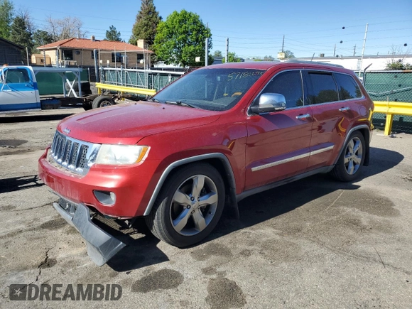 2011 Jeep Grand Cherokee Overland with VIN 1J4RR6GT8BC606688, listed as a Copart auction lot 57182295 with 100,423 mi miles and Salvage title. Bid and sale history available at DreamBid. Image 1.