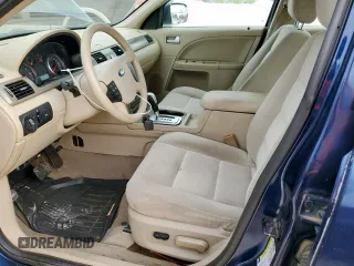 2005 Ford Five Hundred SE z VIN 1FAFP23135G175790, wystawiony jako Copart lot #56588085 z przebiegiem 117 354 mil mil oraz Szkody całkowita. Historia ofert i sprzedaży dostępna na DreamBid. Obrazek 7.
