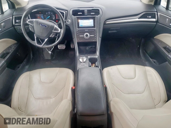 2017 Ford Fusion Hybrid Titanium with VIN 3FA6P0RU7HR388521, listed as a Copart auction lot 57318895 with 117,720 mi miles and Salvage title. Bid and sale history available at DreamBid. Image 8.