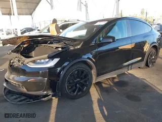 2022 Tesla Model X Plaid with VIN 7SAXCBE60NF351288, listed as a IAAI auction lot 40847518 with NaN miles. Bid and sale history available at carsss.com. Image 17.