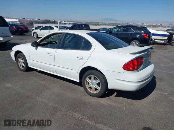 2003 Oldsmobile Alero GL1 z VIN 1G3NL52F53C323443, wystawiony jako IAAI lot #42271207 z przebiegiem 138 180 mil mil oraz . Historia ofert i sprzedaży dostępna na DreamBid. Obrazek 3.