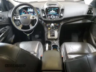 2015 Ford Escape Titanium with VIN 1FMCU9JX9FUA30970, listed as a Copart auction lot 41780275 with 106,114 mi miles and Salvage Title. Bid and sale history available at DreamBid. Image 8.