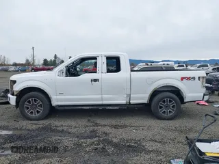 2015 Ford F-150 XLT with VIN 1FTEX1EP1FFA21653, listed as a IAAI auction lot 41597518 with 153,111 mi miles and . Bid and sale history available at DreamBid. Image 15.
