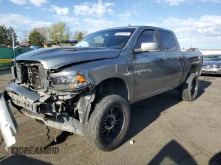 2012 Ram 1500 Sport with VIN 1C6RD7MT8CS150205, listed as a Copart auction lot 56344105 with 145,400 mi miles and Salvage title. Bid and sale history available at DreamBid. Image 1.