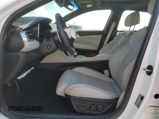2023 Genesis G70 3.3T with VIN KMTG54TE3PU124511, listed as a Copart auction lot 74132184 with 2,534 mi miles and Salvage Title. Bid and sale history available at DreamBid. Image 7.