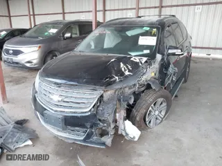 2016 Chevrolet Traverse LT with VIN 1GNKRGKD4GJ212483, listed as a IAAI auction lot 39987074 with 127,444 mi miles. Bid and sale history available at carsss.com. Image 2.