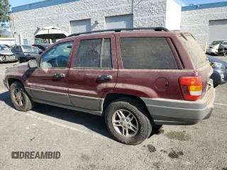 2002 Jeep Grand Cherokee Laredo with VIN 1J4GX48S52C265385, listed as a Copart auction lot 88823385 with 225,106 mi miles and Clean title. Bid and sale history available at DreamBid. Image 2.
