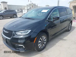 2023 Chrysler Pacifica Hybrid Touring L with VIN 2C4RC1L75PR592251, listed as a IAAI auction lot 42037873 with 44,428 mi miles and . Bid and sale history available at DreamBid. Image 17.