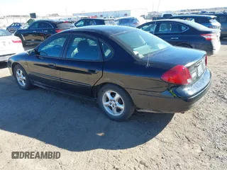 2000 Ford Taurus SE with VIN 1FAFP5321YG249478, listed as a IAAI auction lot 41686339 with 221,015 mi miles and . Bid and sale history available at DreamBid. Image 3.