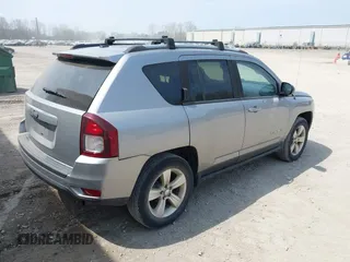 2016 Jeep Compass Sport with VIN 1C4NJDBB1GD566261, listed as a IAAI auction lot 42122853 with 212,060 mi miles. Bid and sale history available at carsss.com. Image 4.