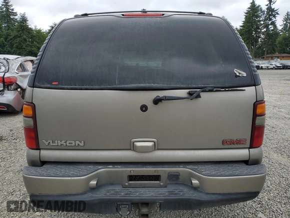 2002 GMC Yukon Denali z VIN 1GKEK63U82J224913, wystawiony jako Copart lot #60664885 z przebiegiem 208 794 mil mil oraz Szkoda całkowita • Salvage title. Historia ofert i sprzedaży dostępna na DreamBid. Obrazek 6.
