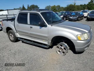 2004 Ford Explorer Sport Trac XLS z VIN 1FMDU77K24UA03885, wystawiony jako Copart lot #75434684 z przebiegiem Nie podano mil oraz Szkoda całkowita • Salvage title. Historia ofert i sprzedaży dostępna na DreamBid. Obrazek 4.