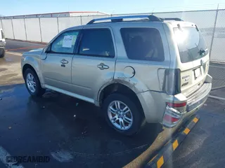 2011 Mercury Mariner Premier with VIN 4M2CN9HG4BKJ05985, listed as a IAAI auction lot 41132168 with 84,031 mi miles. Bid and sale history available at carsss.com. Image 3.