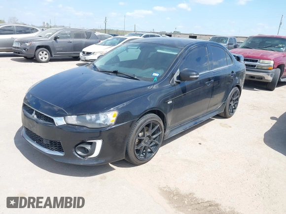 2016 Mitsubishi Lancer GT with VIN JA32U8FW8GU011501, listed as a IAAI auction lot 41779016 with 153,082 mi miles. Bid and sale history available at carsss.com. Image 17.