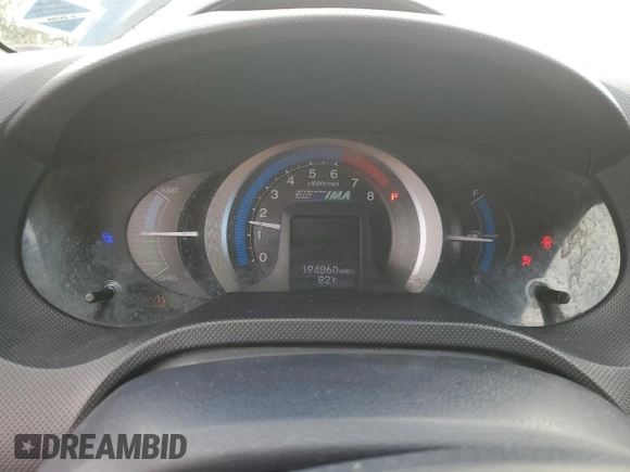 2010 Honda Insight LX with VIN JHMZE2H50AS009869, listed as a Copart auction lot 53031515 with 194,860 mi miles and Salvage Title. Bid and sale history available at DreamBid. Image 9.