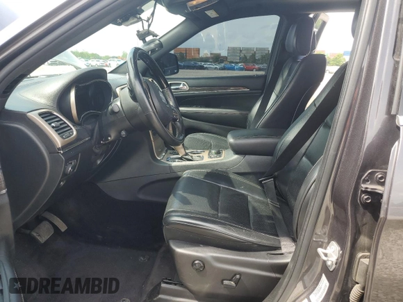 2017 Jeep Grand Cherokee Overland z VIN 1C4RJFCG1HC684826, wystawiony jako Copart lot #59971595 z przebiegiem 101 765 mil mil oraz Szkoda całkowita • Salvage title. Historia ofert i sprzedaży dostępna na DreamBid. Obrazek 7.