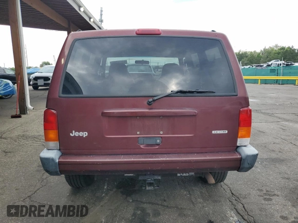 2000 Jeep Cherokee with VIN 1J4FF48SXYL198290, listed as a Copart auction lot 66026705 with 201,409 mi miles and Clean title. Bid and sale history available at DreamBid. Image 6.