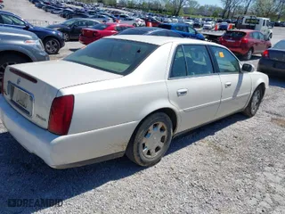 2002 Cadillac DeVille with VIN 1G6KD54Y92U233075, listed as a IAAI auction lot 42034186 with 1 mi miles. Bid and sale history available at carsss.com. Image 4.