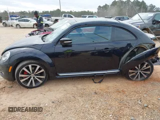 2012 Volkswagen Beetle 2.0T Turbo with VIN 3VW467AT9CM658495, listed as a IAAI auction lot 41505160 with 138,842 mi miles. Bid and sale history available at carsss.com. Image 15.