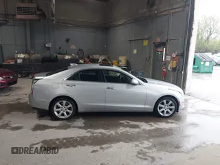 2016 Cadillac ATS Standard AWD z VIN 1G6AG5RX6G0149829, wystawiony jako IAAI lot #42165534 z przebiegiem 40 996 mil mil oraz . Historia ofert i sprzedaży dostępna na DreamBid. Obrazek 13.