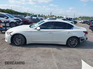 2020 Infiniti Q50 Luxe with VIN JN1EV7AP6LM201462, listed as a IAAI auction lot 42090939 with 50,633 mi miles and . Bid and sale history available at DreamBid. Image 15.