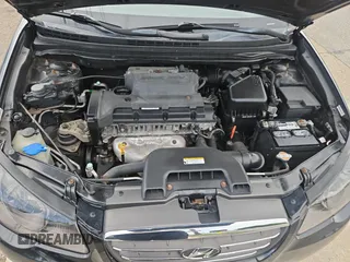 2009 Hyundai Elantra SE with VIN KMHDU46DX9U815198, listed as a Copart auction lot 61820665 with 92,543 mi miles and Clean title. Bid and sale history available at DreamBid. Image 7.
